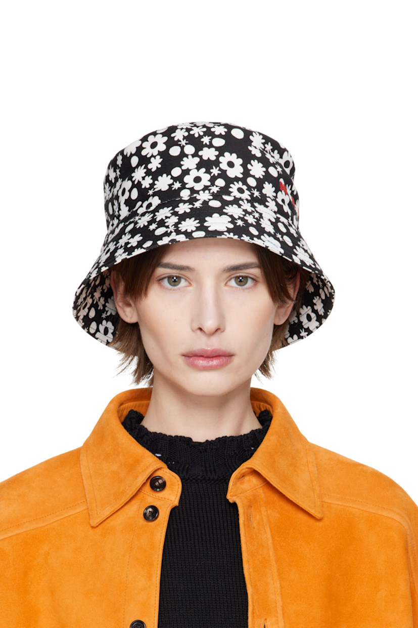 Cotton twill bucket hat in black. 

· Floral pattern printed throughout
· Logo embroidered at face
· Quilted brim
· Grosgrain browband

Supplier color: Black