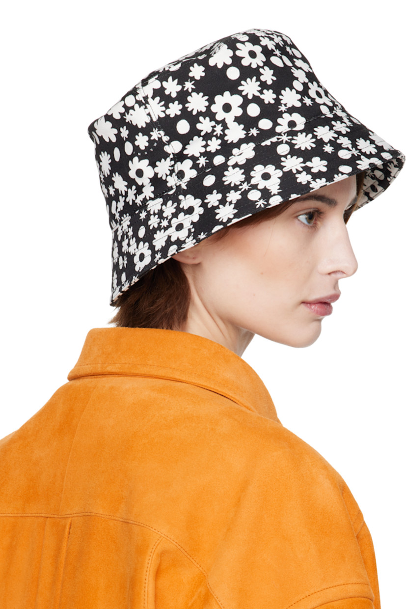 Cotton twill bucket hat in black. 

· Floral pattern printed throughout
· Logo embroidered at face
· Quilted brim
· Grosgrain browband

Supplier color: Black
