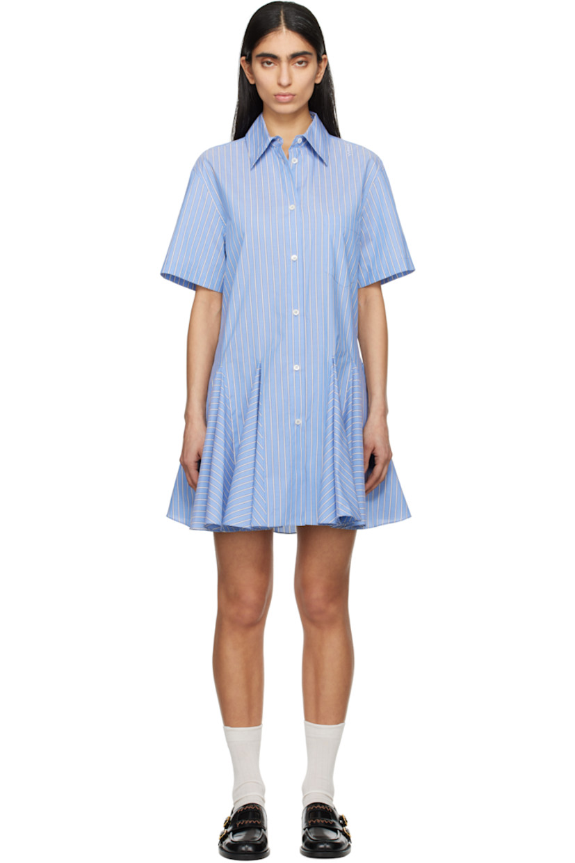 Yarn-dyed cotton poplin minidress. Stripes throughout.

· Spread collar
· Button closure
· Patch pocket at chest
· Godet panels at flared hem
· Hand-embroidered logo at shoulder
· Box pleat at yoke
· Mother-of-pearl hardware

Supplier color: Blue china