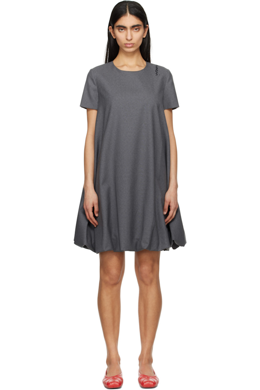 Virgin wool delaine minidress.

· Round neck
· Bubble hem
· Hand-embroidered logo at shoulder
· Keyhole at back collar
· Full cupro- and silk-blend satin lining

Supplier color: Graphite