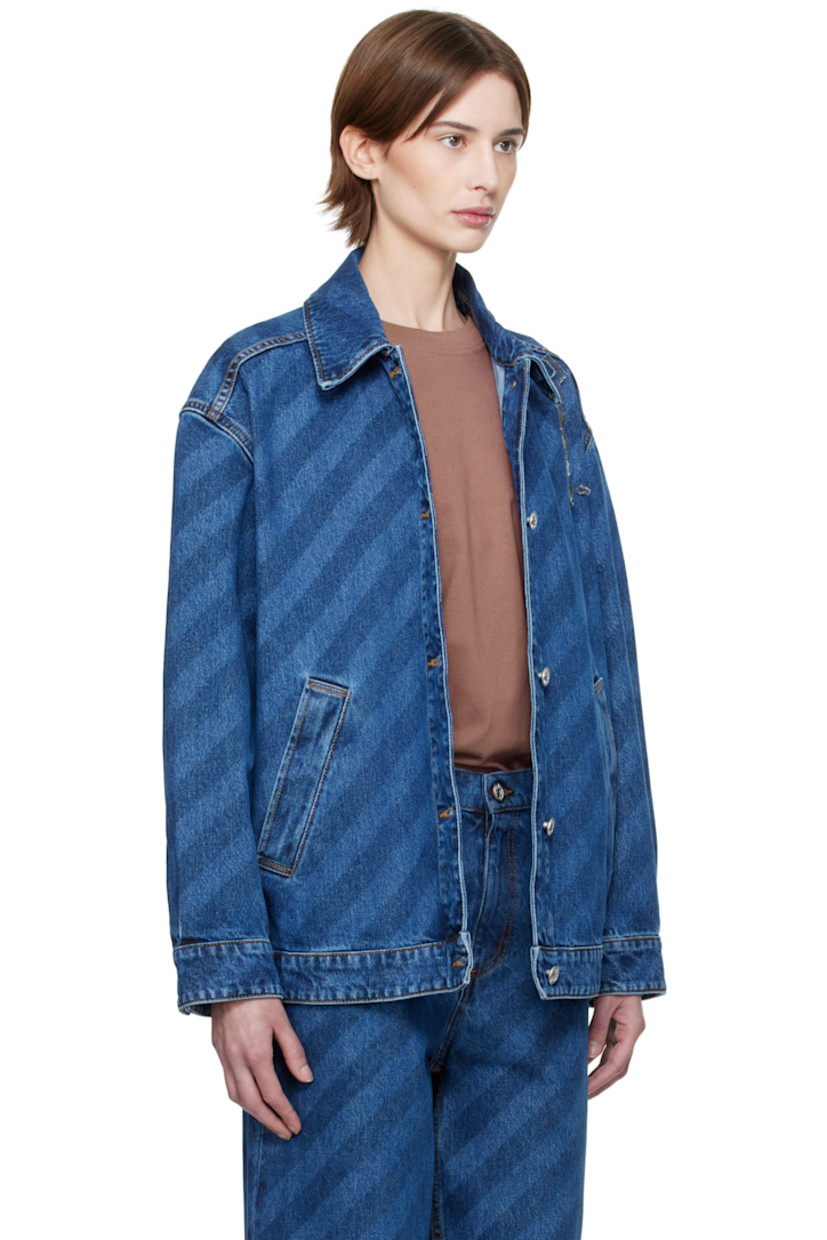 Non-stretch denim jacket. Stripes throughout. 

· Spread collar
· Button closure
· Welt pockets
· Logo appliqué at shoulder
· Single-button cuffs
· Adjustable button tabs at back hem 
· Logo-engraved silver-tone hardware
· Contrast stitching in tan

Supplier color: Blue kyanite