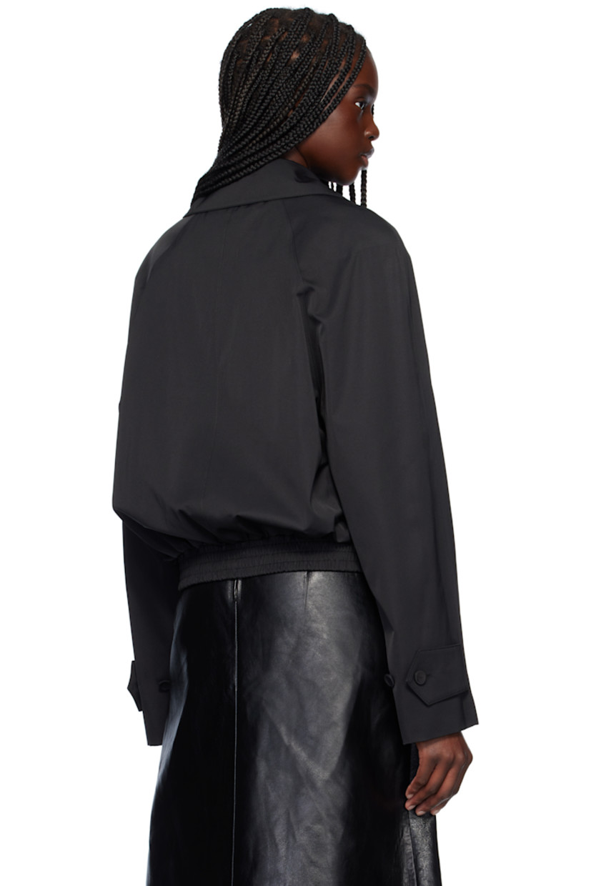 Polyester- and cotton-blend taffeta jacket. 

· Water-repellent 
· Open spread collar
· Concealed button closure
· Welt pockets
· Partially elasticized hem 
· Logo stitched at shoulder
· Raglan sleeves
· Adjustable button tab at cuffs
· Full twill lining

Supplier color: Black