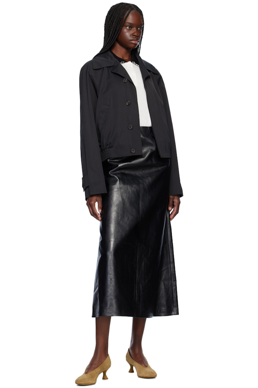 Polyester- and cotton-blend taffeta jacket. 

· Water-repellent 
· Open spread collar
· Concealed button closure
· Welt pockets
· Partially elasticized hem 
· Logo stitched at shoulder
· Raglan sleeves
· Adjustable button tab at cuffs
· Full twill lining

Supplier color: Black