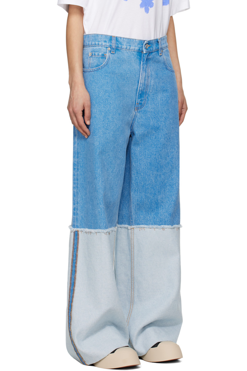 Wide-leg and loose-fit non-stretch denim jeans. Fading throughout.

· Paneled construction
· Low-rise
· Belt loops
· Five-pocket styling
· Zip-fly
· Frayed edge and topstitching at knees
· Extended rolled cuffs
· Suede logo patch at back waistband
· Logo-engraved silver-tone hardware
· Contrast stitching in tan

Supplier color: Cobalt