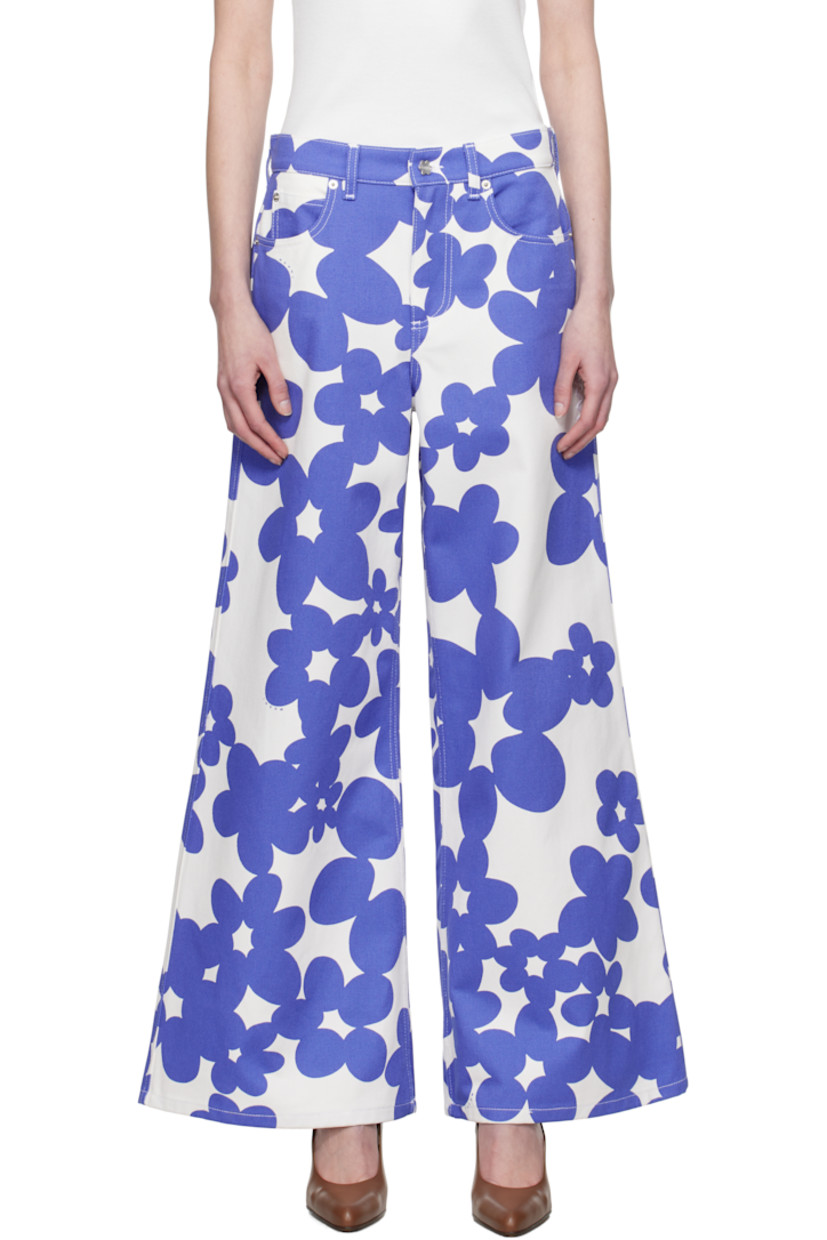 Wide-leg cotton gabardine trousers. Floral pattern and logos printed throughout.

· Low-rise
· Belt loops
· Five-pocket styling
· Zip fly
· Hand-embroidered logo at front
· Flared legs
· Darts at back waistband
· Logo-engraved silver-tone hardware
· Contrast stitching in white

Supplier color: Blue lilac