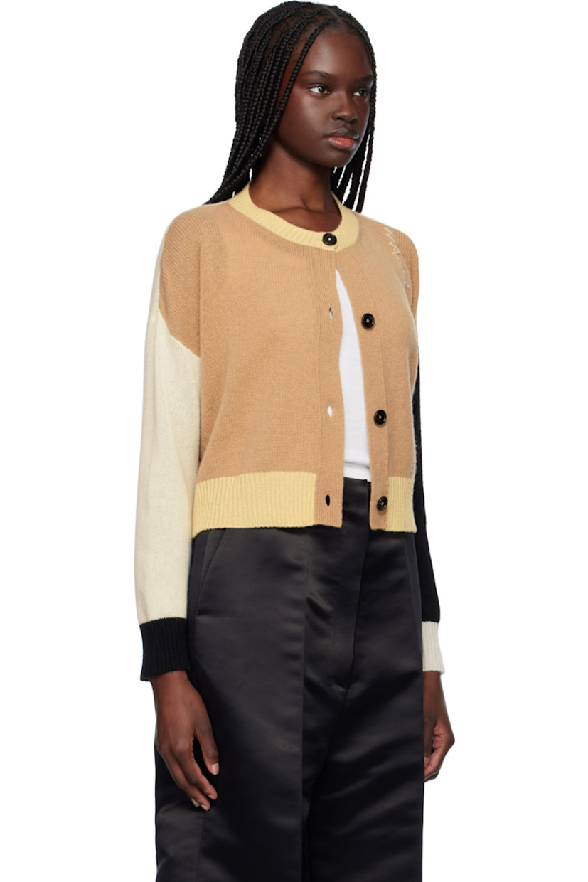 Knit cashmere cardigan. 

· Rib-knit crewneck, hem, and cuffs
· Button closure
· Hand-embroidered logo at shoulder

Supplier color: Winter wheat