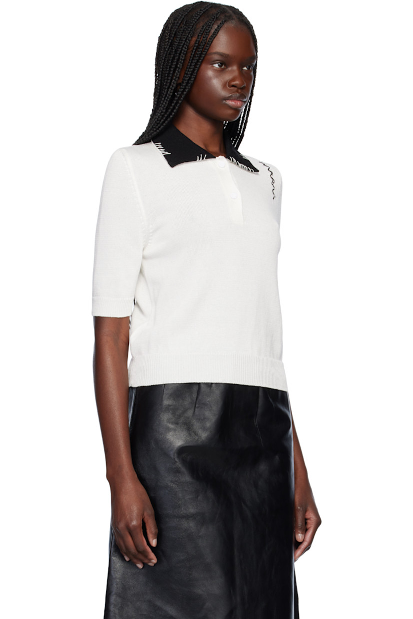 Knit cotton polo. 

· Rib-knit spread collar, hem, and cuffs
· Two-button placket
· Hand-stitched logo at shoulder
· Contrast stitching in white and black

Supplier color: Natural white