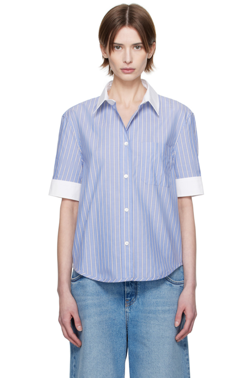 Cotton poplin shirt. Stripes throughout.

· Spread collar
· Button closure
· Patch pocket
· Shirttail hem
· Hand-embroidered logo at shoulder 
· Pleated single-button cuffs
· Box pleat at back yoke 

Supplier color: Blue china