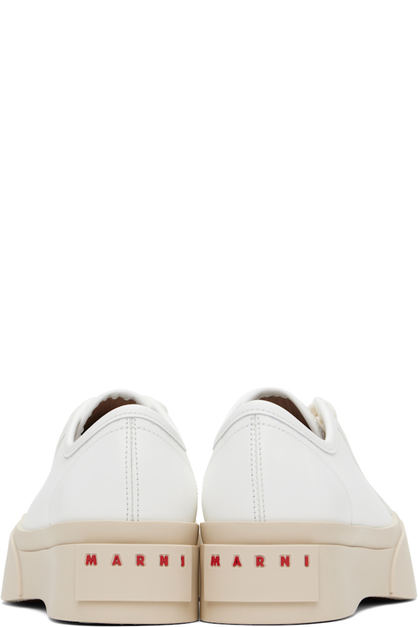 Low-top buffed nappa calfskin sneakers in white.

· Rubber cap toe
· Lace-up closure
· Logo patch at tongue
· Metal eyelets at inner side
· Buffed sheepskin lining
· Logo embossed at heel
· Treaded rubber platform sole
· Platform: H1.75"

Supplier color: Lilywhite
