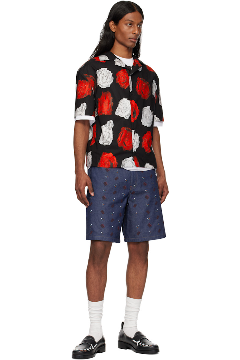 Cotton poplin shirt. Floral pattern printed throughout.

· Open spread collar
· Button closure

Supplier color: Black