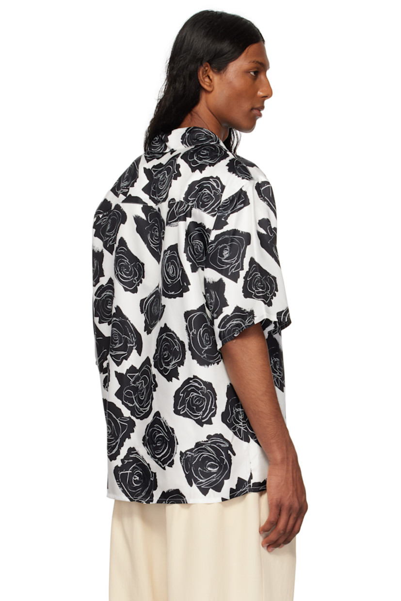 Silk satin shirt. Floral pattern printed throughout.

· Open spread collar
· Button closure
· Patch pocket

Supplier color: Lily white