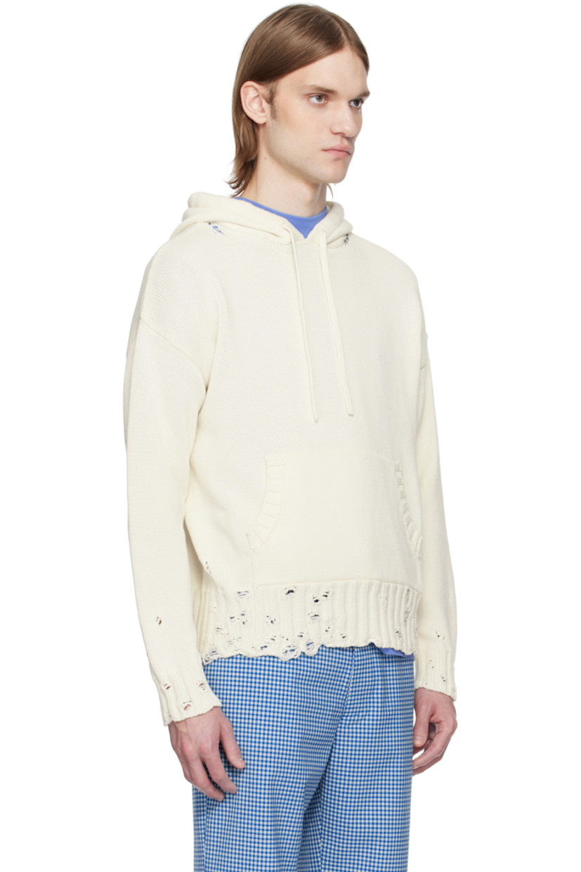 Knit cotton hoodie. Distressing throughout.

· Drawstring at hood
· Rib-knit trim at hood and kangaroo pocket
· Hand-stitched logo at collar
· Rib-knit hem and cuffs
· Dropped shoulders

Supplier color: Lily white