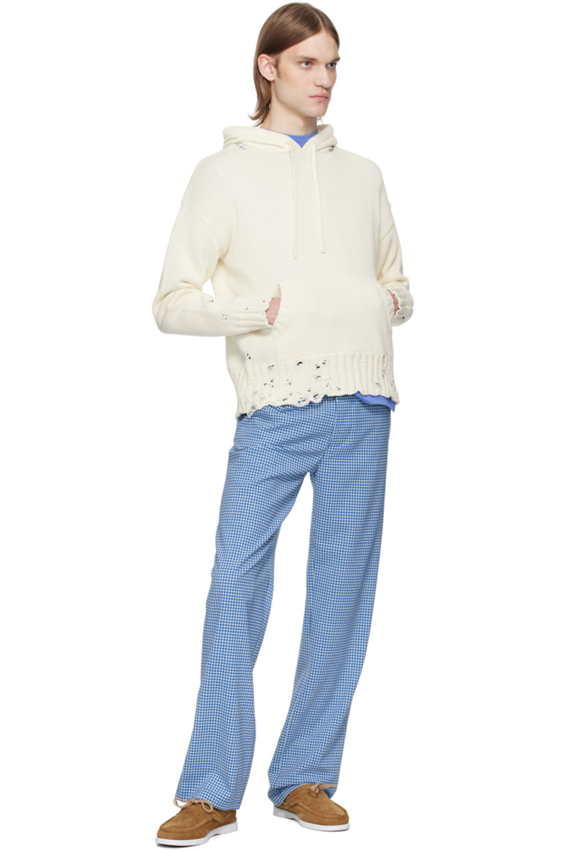 Knit cotton hoodie. Distressing throughout.

· Drawstring at hood
· Rib-knit trim at hood and kangaroo pocket
· Hand-stitched logo at collar
· Rib-knit hem and cuffs
· Dropped shoulders

Supplier color: Lily white
