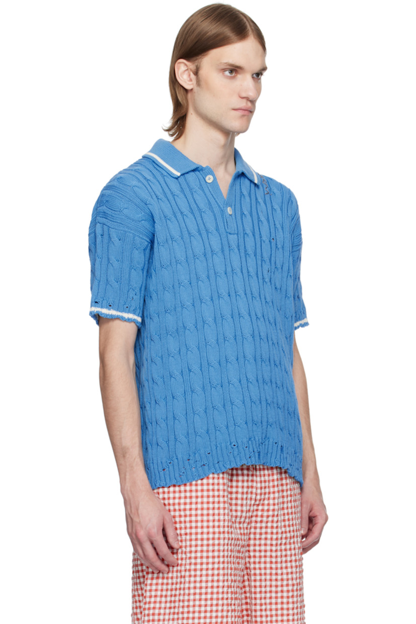 Cable-knit cotton polo. Distressing throughout.

· Rib-knit spread collar, hem, and cuffs
· Stripe at collar and cuffs
· Two-button placket
· Hand-stitched logo at shoulder
· Dropped shoulders

Supplier color: Azure