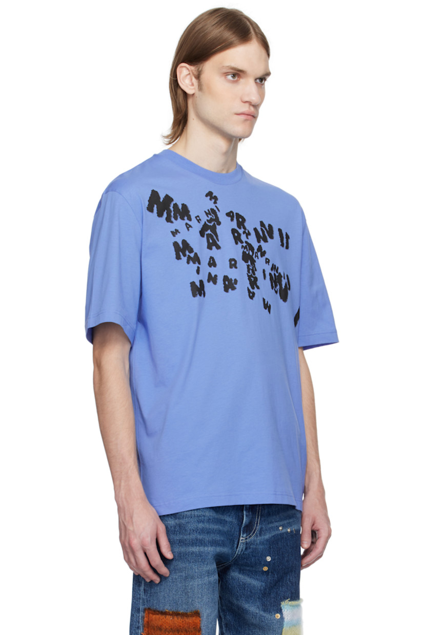 Loose-fit cotton jersey T-shirt.

· Rib-knit crewneck
· Logo graphic printed at chest
· Tennis-tail hem

Supplier color: Blue lilac