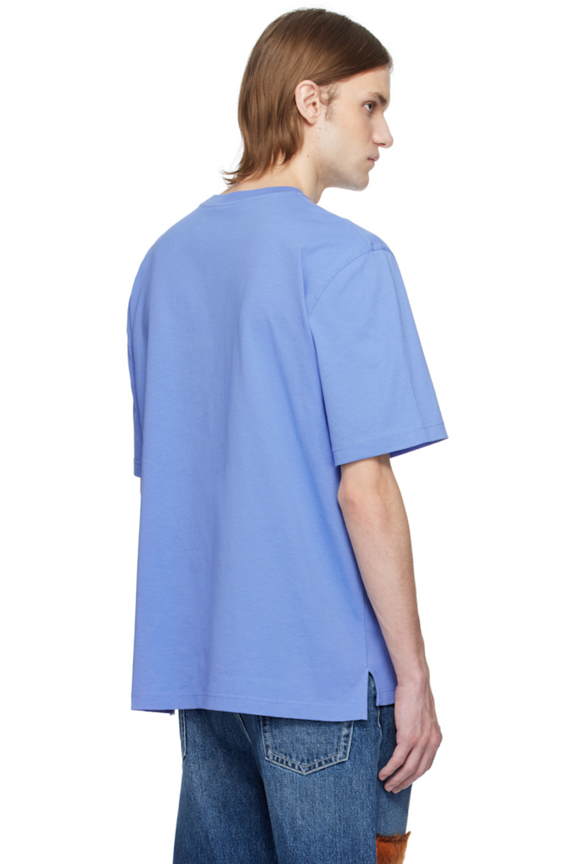 Loose-fit cotton jersey T-shirt.

· Rib-knit crewneck
· Logo graphic printed at chest
· Tennis-tail hem

Supplier color: Blue lilac