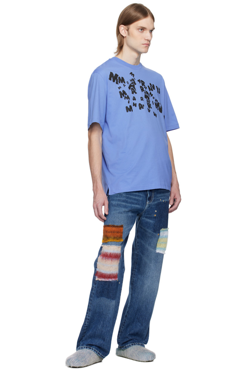Loose-fit cotton jersey T-shirt.

· Rib-knit crewneck
· Logo graphic printed at chest
· Tennis-tail hem

Supplier color: Blue lilac