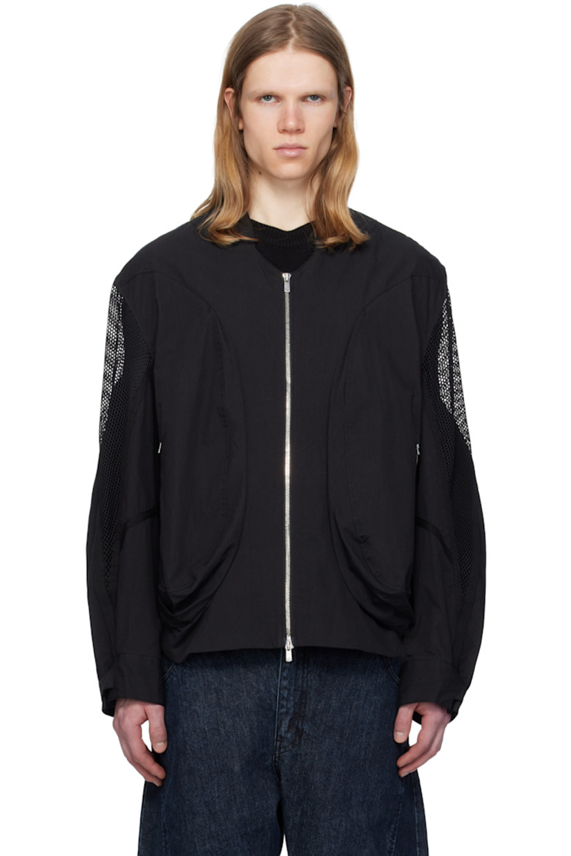 Cotton- and nylon-blend taffeta bomber jacket. 

· Stand collar 
· Two-way zip closure 
· Zip pockets 
· Concealed bungee-style drawstring at hem 
· Pleat at side seams 
· Mesh and webbing trim at yoke sleeves
· Adjustable velcro fastening at cuffs 
· Patch pocket at interior 
· Full satin lining 

Supplier color: Black