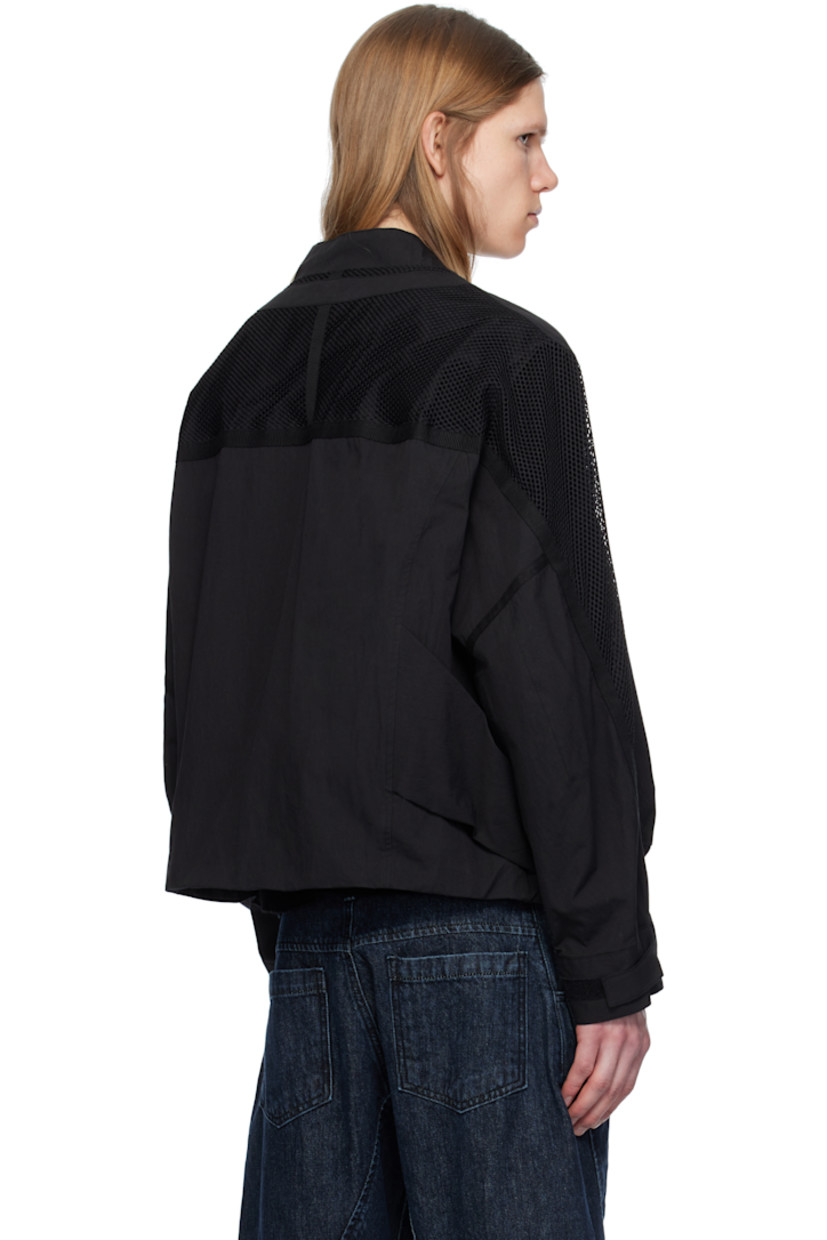 Cotton- and nylon-blend taffeta bomber jacket. 

· Stand collar 
· Two-way zip closure 
· Zip pockets 
· Concealed bungee-style drawstring at hem 
· Pleat at side seams 
· Mesh and webbing trim at yoke sleeves
· Adjustable velcro fastening at cuffs 
· Patch pocket at interior 
· Full satin lining 

Supplier color: Black