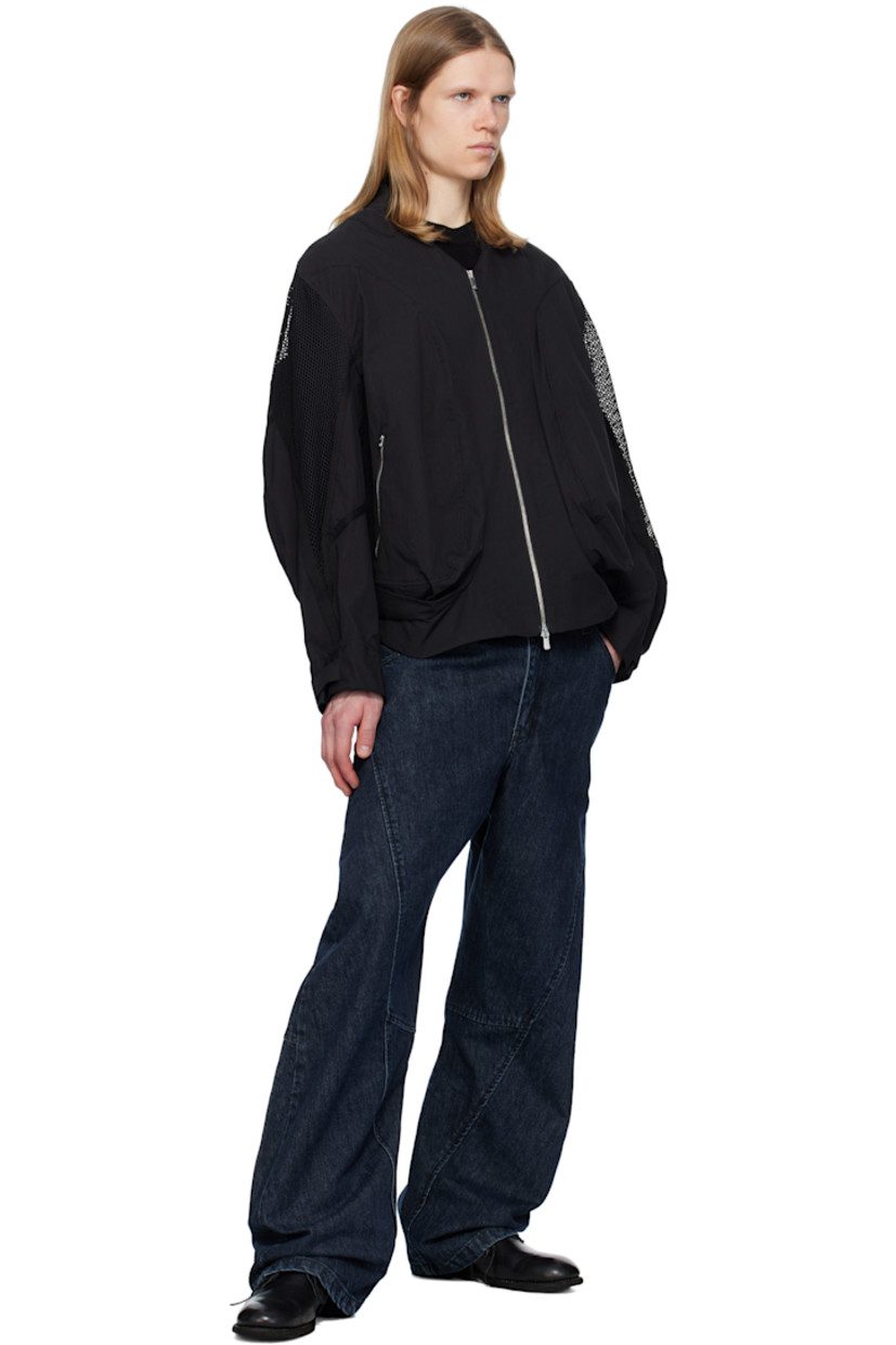 Cotton- and nylon-blend taffeta bomber jacket. 

· Stand collar 
· Two-way zip closure 
· Zip pockets 
· Concealed bungee-style drawstring at hem 
· Pleat at side seams 
· Mesh and webbing trim at yoke sleeves
· Adjustable velcro fastening at cuffs 
· Patch pocket at interior 
· Full satin lining 

Supplier color: Black