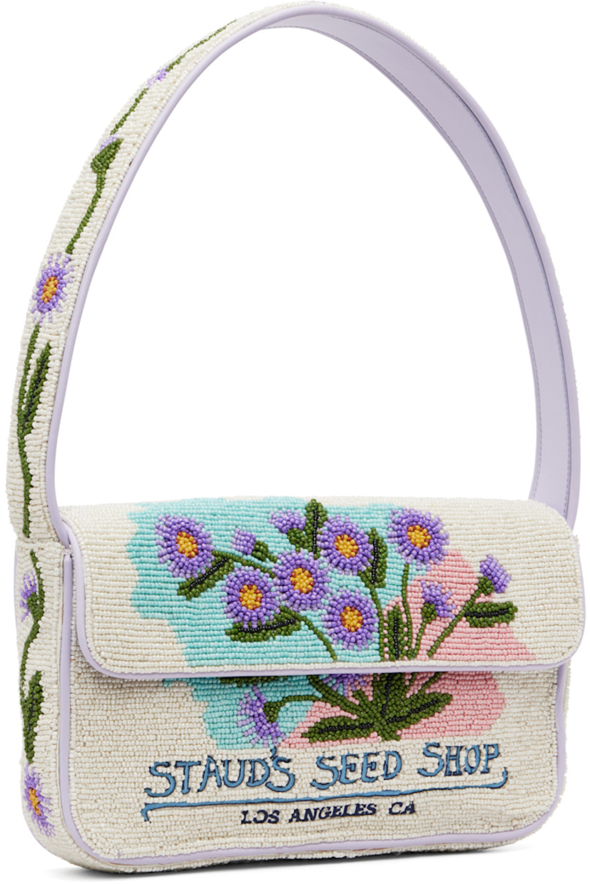 Hand-beaded shoulder bag.

· Beaded floral graphics and faux-leather trim throughout
· Fixed shoulder strap
· Text embroidered at face and back face
· Patch pocket and beaded logo at back face
· Magnetic press-stud flap
· Zip pocket at interior
· Satin lining
· H6.25" x W10" x D2"

Supplier color: California aster