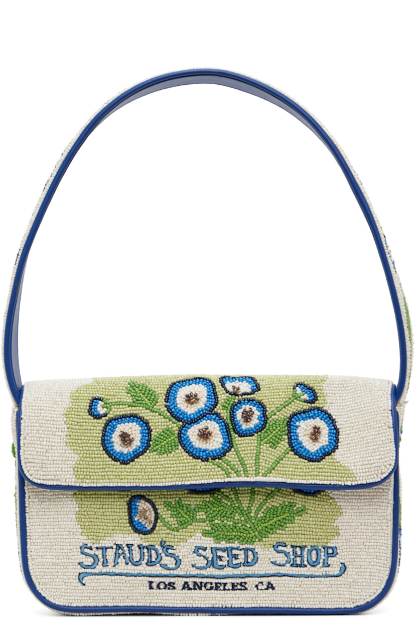 Hand-beaded shoulder bag.

· Beaded floral graphics and faux-leather trim throughout
· Fixed shoulder strap
· Text embroidered at face and back face
· Patch pocket and beaded logo at back face
· Magnetic press-stud flap
· Zip pocket at interior
· Satin lining
· H6.25" x W10" x D2"

Supplier color: Baby blue eyes