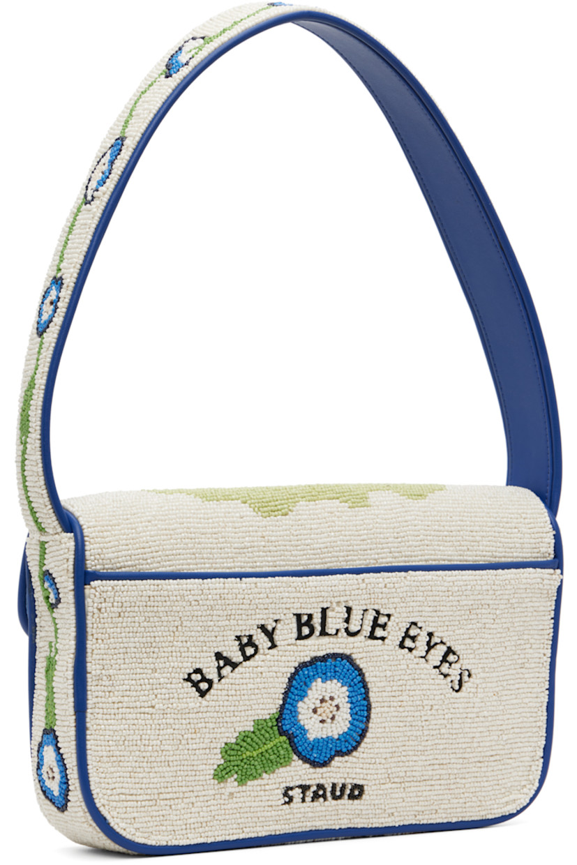 Hand-beaded shoulder bag.

· Beaded floral graphics and faux-leather trim throughout
· Fixed shoulder strap
· Text embroidered at face and back face
· Patch pocket and beaded logo at back face
· Magnetic press-stud flap
· Zip pocket at interior
· Satin lining
· H6.25" x W10" x D2"

Supplier color: Baby blue eyes