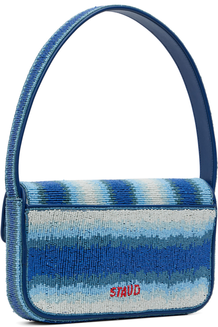 Hand-beaded shoulder bag.

· Stripes and faux-leather trim throughout
· Fixed shoulder strap
· Patch pocket and beaded logo at back face
· Magnetic press-stud flap
· Zip pocket at interior
· Satin lining
· H6.25" x W10" x D2"

Supplier color: Ride the wave