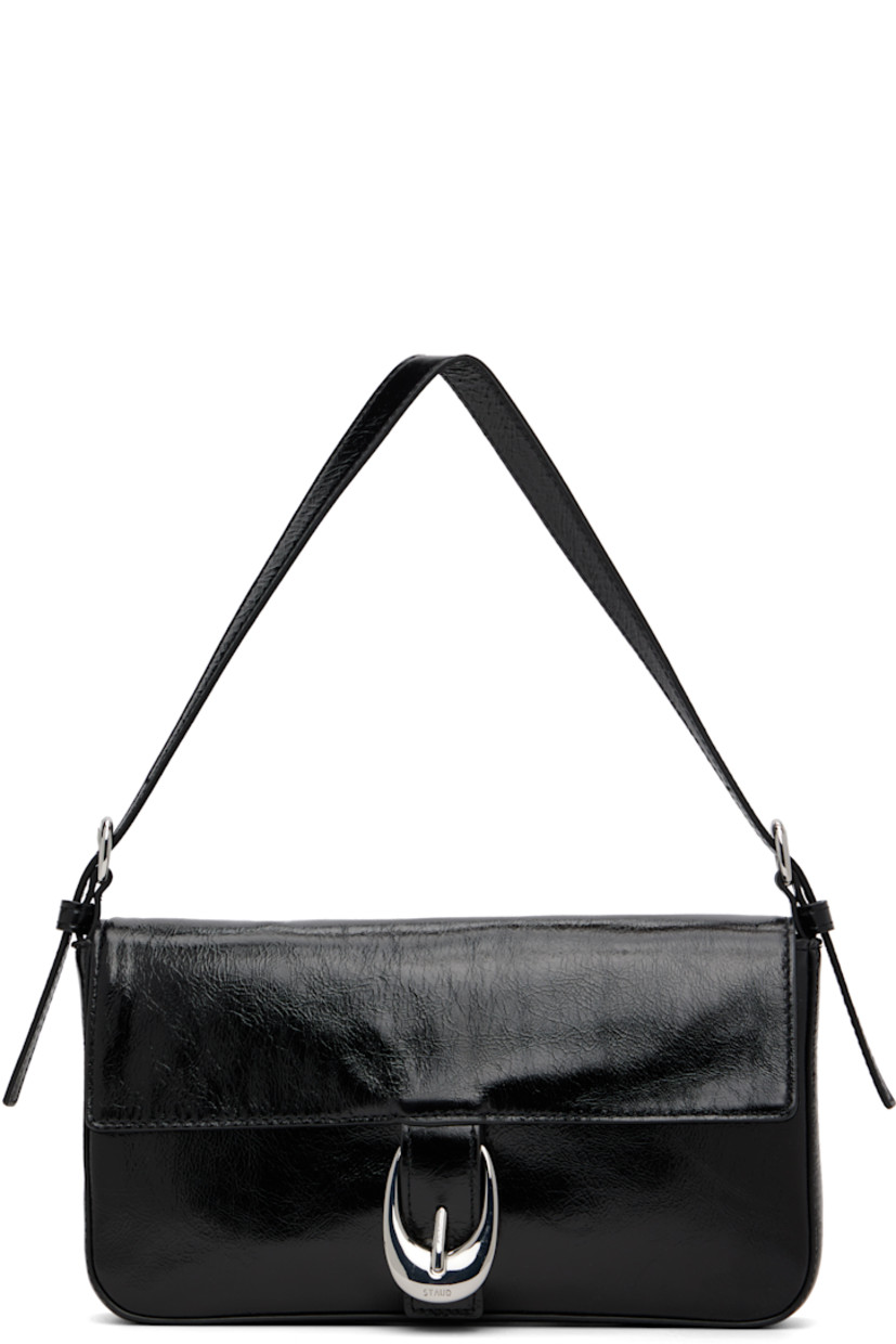 Crinkled and polished leather shoulder bag.

· Adjustable shoulder strap
· Logo embossed at back face
· Pin-buckle hardware at magnetic press-stud flap
· Zip pocket at interior
· Suede lining
· H5" x W9.75" x D1.5"

Supplier color: Black