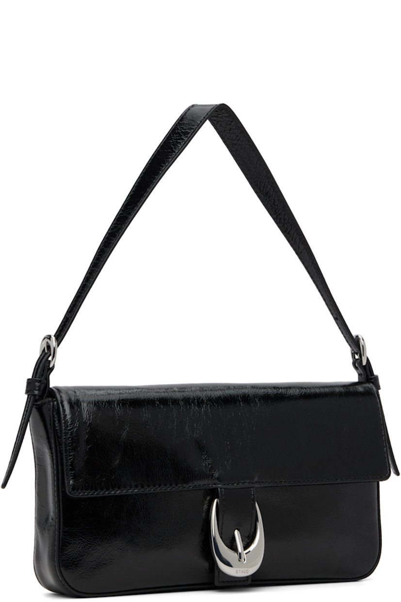 Crinkled and polished leather shoulder bag.

· Adjustable shoulder strap
· Logo embossed at back face
· Pin-buckle hardware at magnetic press-stud flap
· Zip pocket at interior
· Suede lining
· H5" x W9.75" x D1.5"

Supplier color: Black