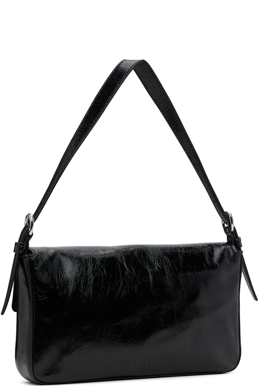 Crinkled and polished leather shoulder bag.

· Adjustable shoulder strap
· Logo embossed at back face
· Pin-buckle hardware at magnetic press-stud flap
· Zip pocket at interior
· Suede lining
· H5" x W9.75" x D1.5"

Supplier color: Black