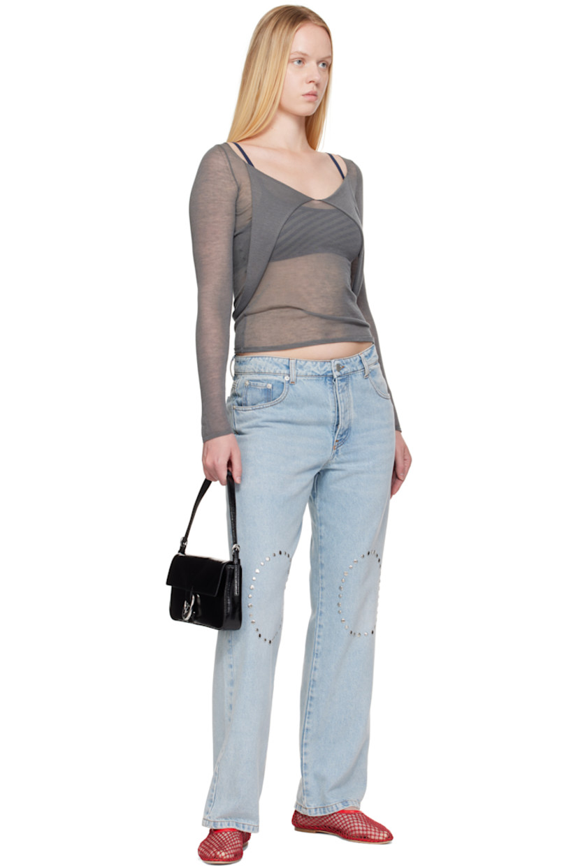 Crinkled and polished leather shoulder bag.

· Adjustable shoulder strap
· Logo embossed at back face
· Pin-buckle hardware at magnetic press-stud flap
· Zip pocket at interior
· Suede lining
· H5" x W9.75" x D1.5"

Supplier color: Black