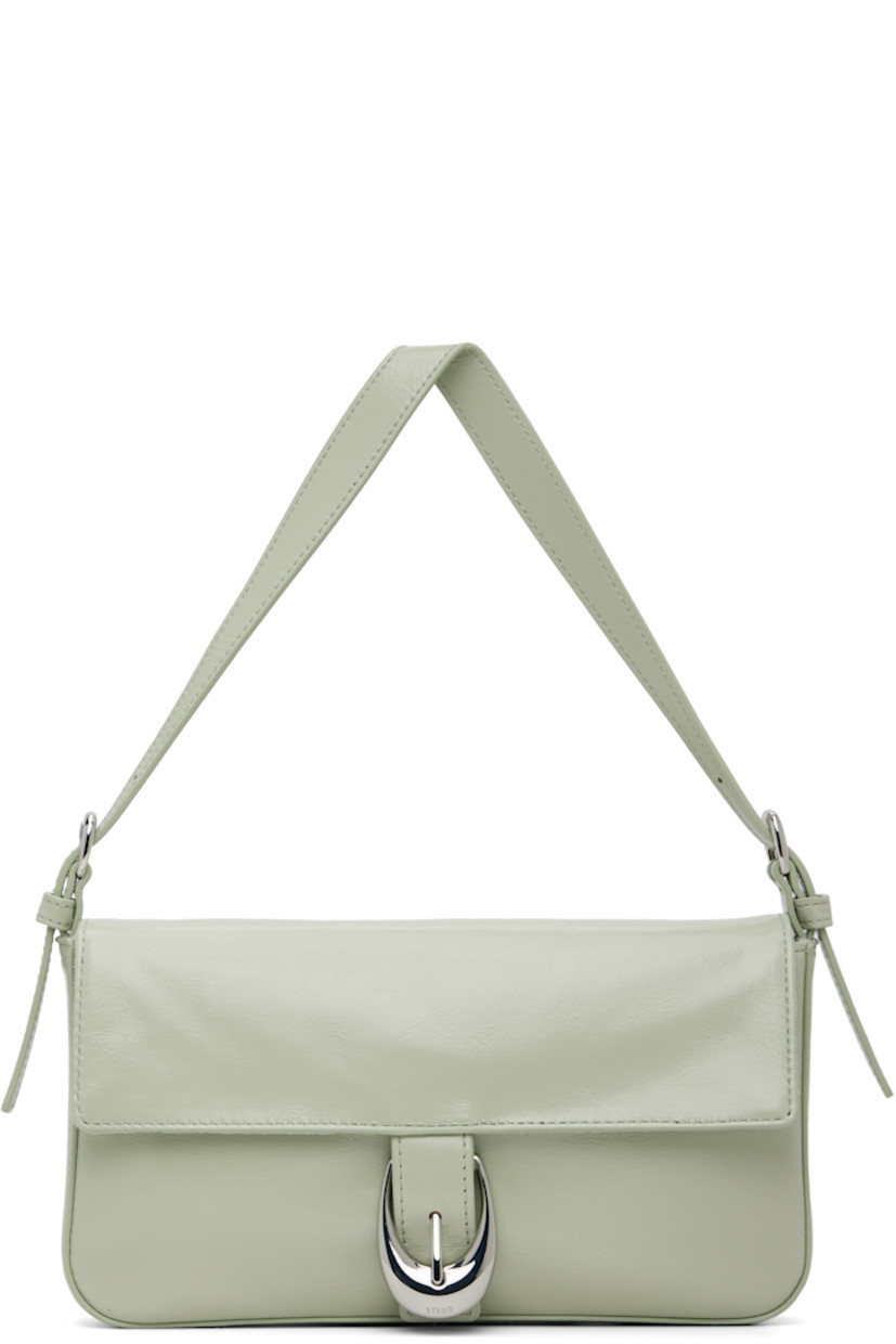Crinkled and polished leather shoulder bag.

· Adjustable shoulder strap
· Logo embossed at back face
· Pin-buckle hardware at magnetic press-stud flap
· Zip pocket at suede interior
· Logo-engraved silver-tone hardware
· H5" x W9.75" x D1.5"

Supplier color: Pale jade