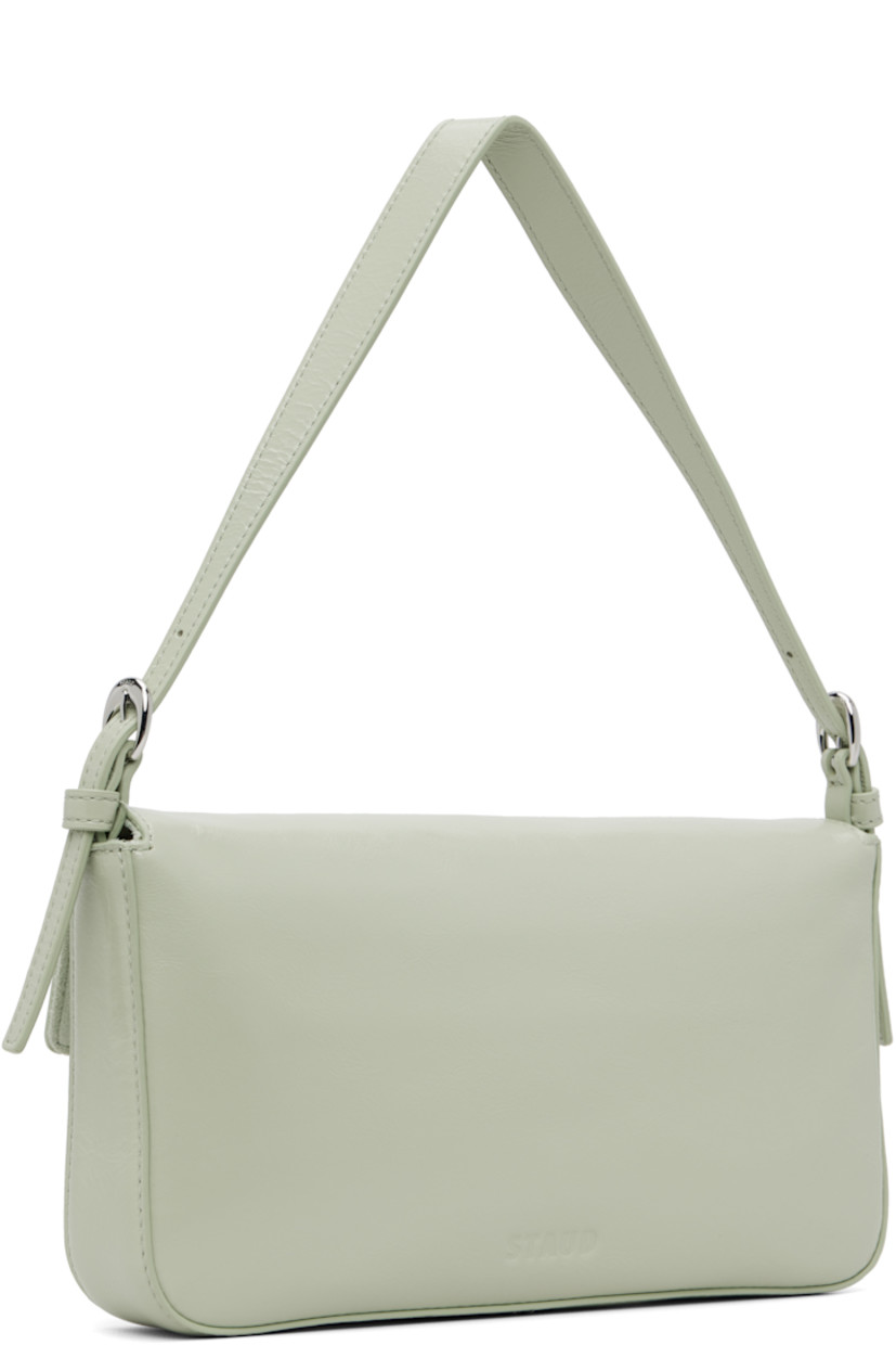 Crinkled and polished leather shoulder bag.

· Adjustable shoulder strap
· Logo embossed at back face
· Pin-buckle hardware at magnetic press-stud flap
· Zip pocket at suede interior
· Logo-engraved silver-tone hardware
· H5" x W9.75" x D1.5"

Supplier color: Pale jade