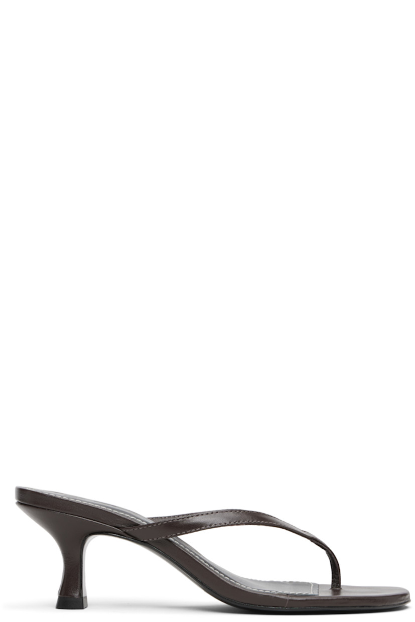 Buffed leather heeled sandals.

· Open square toe
· Thong-style strap at vamp
· Logo embossed at padded leather footbed
· Leather-covered kitten heel with rubber injection.
· Leather sole
· Heel: H2"

Supplier color: Espresso