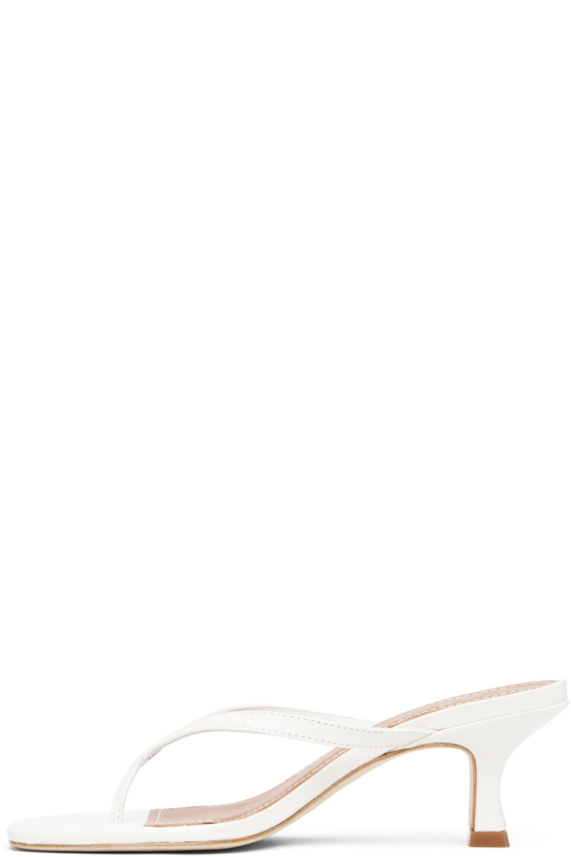 Buffed leather heeled sandals.

· Open square toe
· Thong-style strap at vamp
· Logo embossed at padded leather footbed
· Leather-covered kitten heel with rubber injection.
· Leather sole
· Heel: H2"

Supplier color: Paper