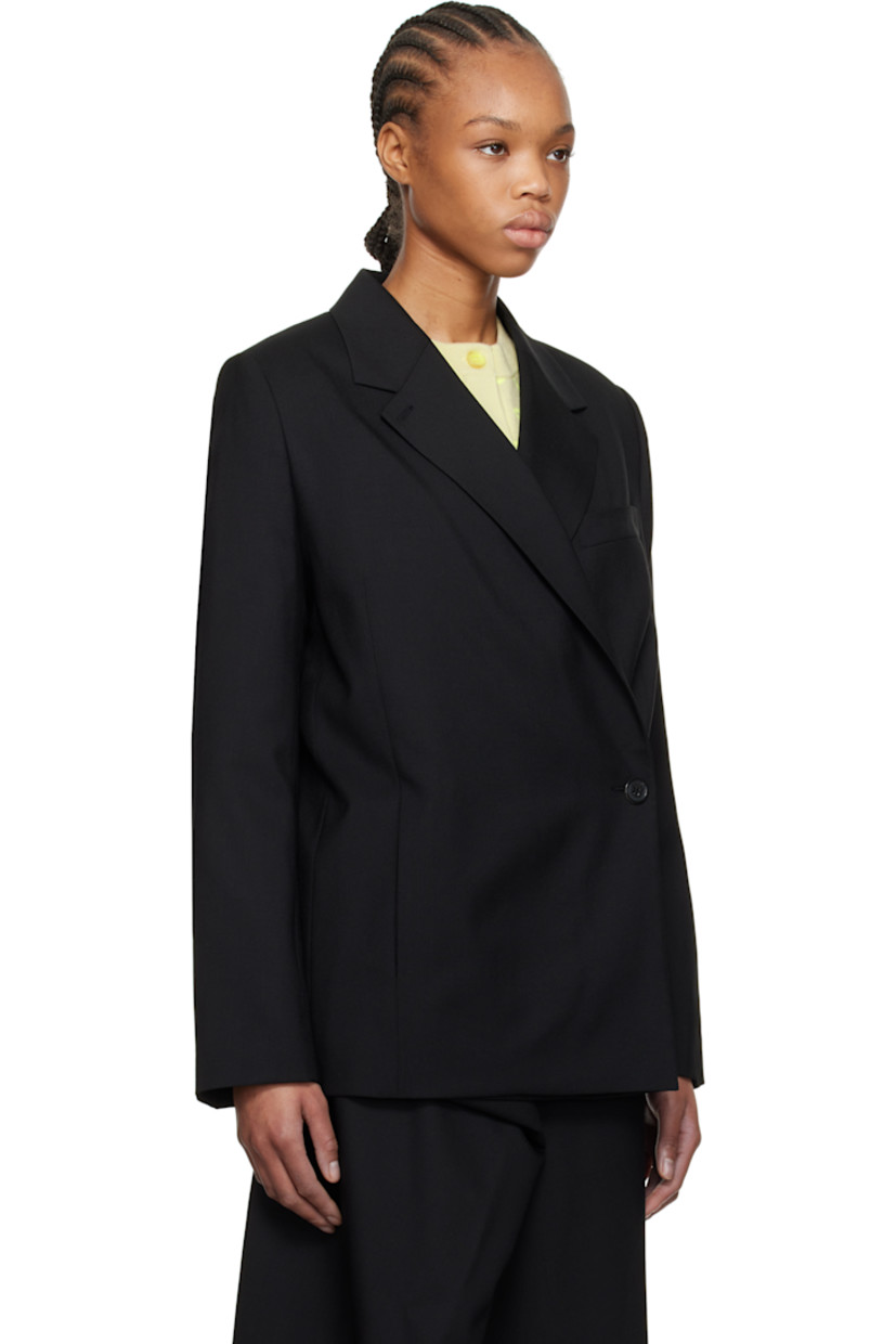 Plain-woven virgin wool blazer. 

· Notched lapel
· Double-breasted button closure
· Welt pockets
· Padded shoulders
· Embroidered logo patch at cuff
· Central vent at back hem 
· Welt pocket at interior
· Full logo-woven satin lining 

Supplier color: Black