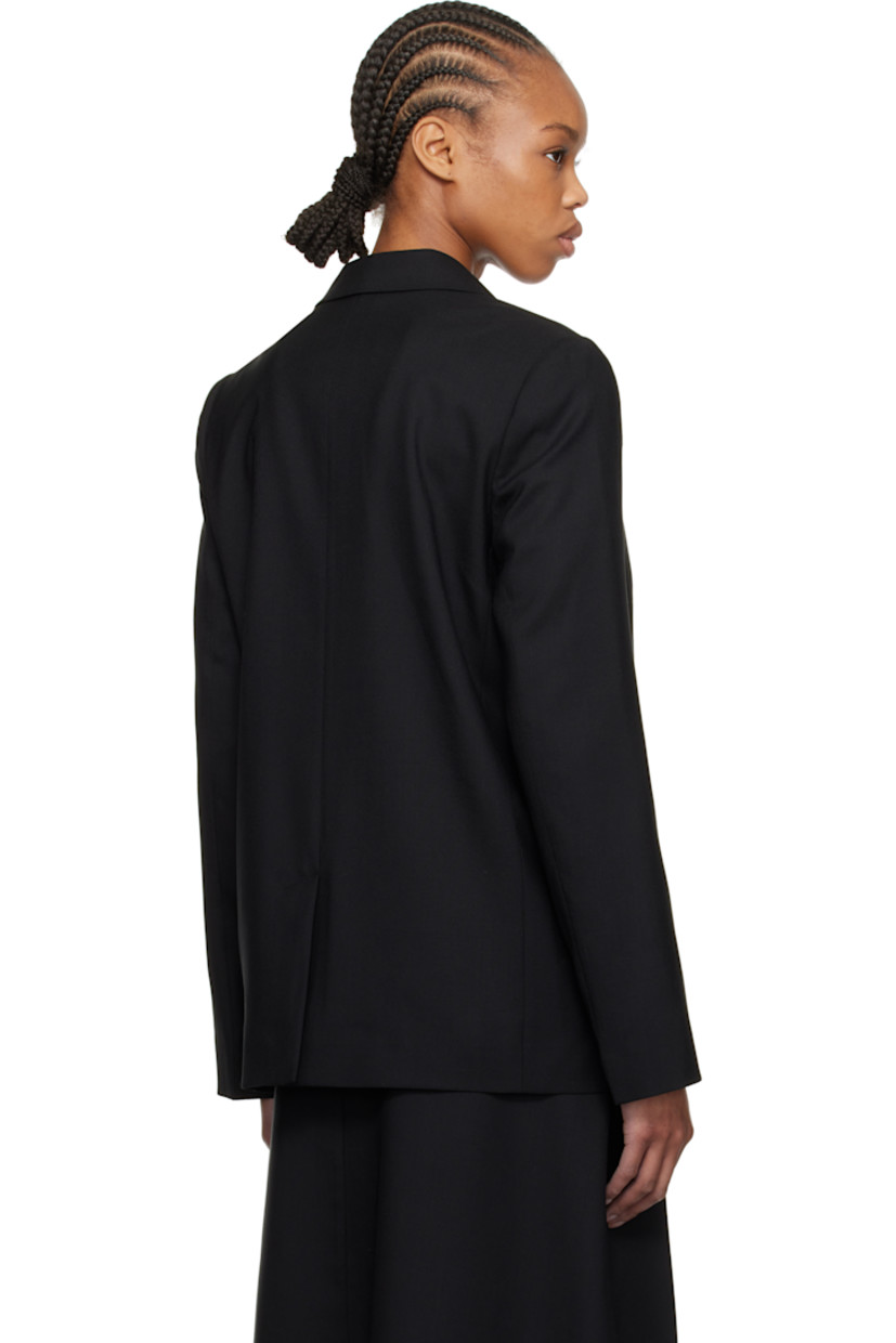 Plain-woven virgin wool blazer. 

· Notched lapel
· Double-breasted button closure
· Welt pockets
· Padded shoulders
· Embroidered logo patch at cuff
· Central vent at back hem 
· Welt pocket at interior
· Full logo-woven satin lining 

Supplier color: Black