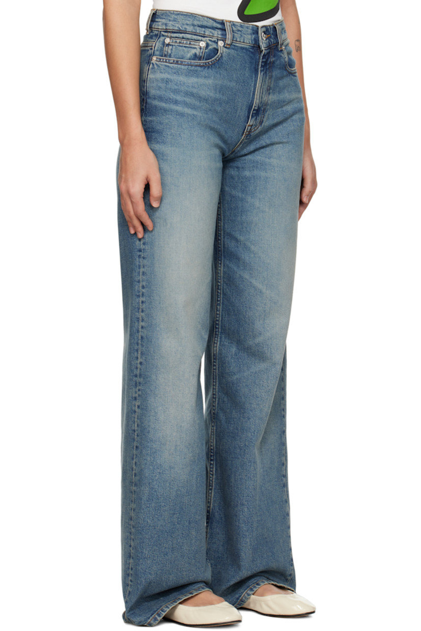 Stretch denim jeans. Fading and whiskering throughout.

· Belt loops
· Five-pocket styling 
· Zip-fly 
· Leather logo patch at back waistband
· Logo-engraved silver-tone hardware
· Contrast stitching in tan

Supplier color: Medium stone blue