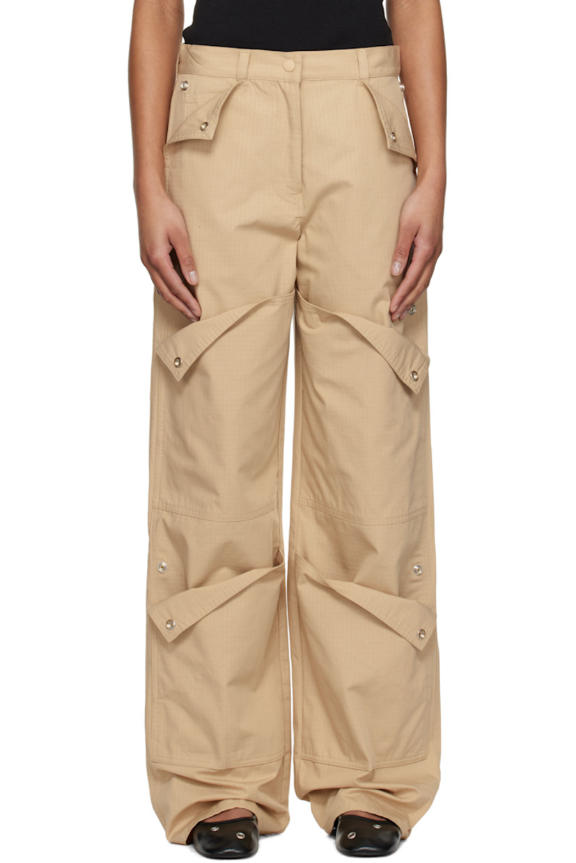 Cotton ripstop cargo pants. Patch pockets and press-stud fastenings throughout.

· Paneled construction 
· Belt loops
· Four-pocket styling
· Zip fly
· Hammer loop at outseam
· Embroidered logo patch at back pocket

Supplier color: Beige