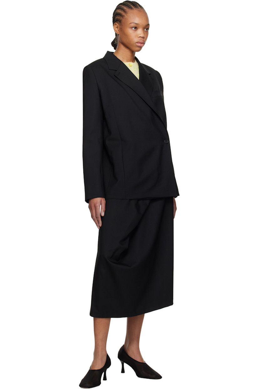 Plain-woven virgin wool midi skirt. 

· Wrap construction
· Adjustable button fastenings at waistband
· Full twill lining 

Supplier color: Black