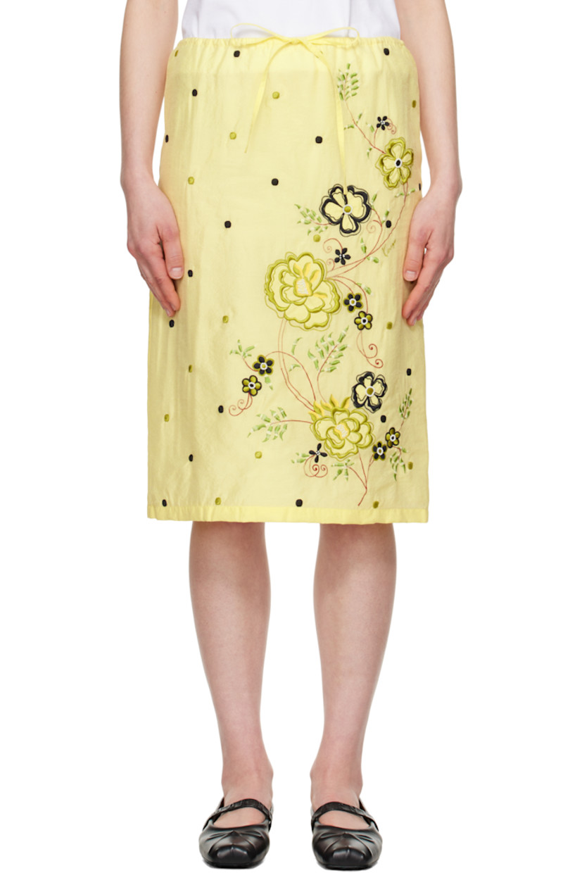 Viscose- and cotton-blend organza midi skirt. Polka-dot pattern embroidered throughout. 

· Drawstring at elasticized waistband
· Embroidered and beaded floral graphic at front
· Full viscose twill lining

Supplier color: Vanilla