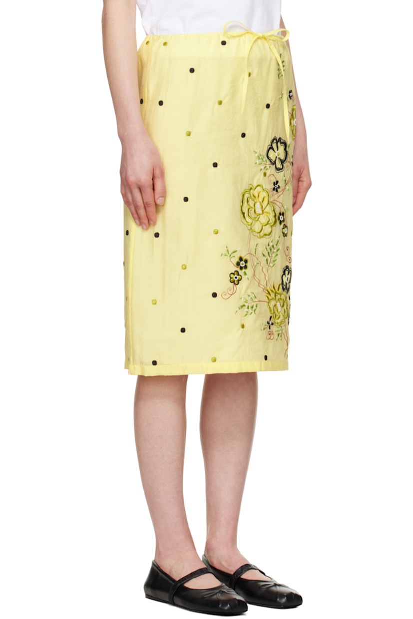 Viscose- and cotton-blend organza midi skirt. Polka-dot pattern embroidered throughout. 

· Drawstring at elasticized waistband
· Embroidered and beaded floral graphic at front
· Full viscose twill lining

Supplier color: Vanilla