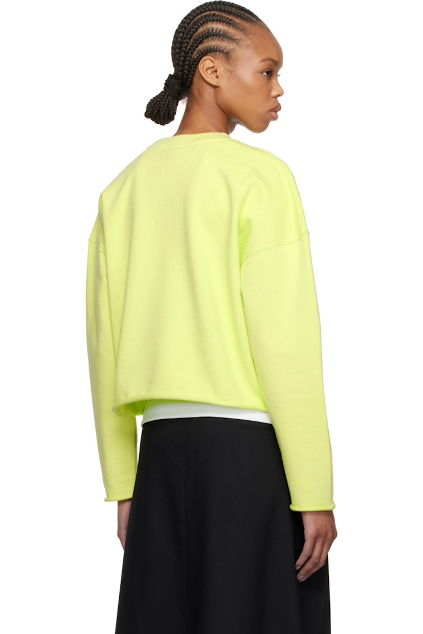 French terry sweatshirt. 

· Rib-knit crewneck
· Crystal-cut floral graphics and printed logo at front 
· Rolled raw edge at hem and cuffs
· Dropped shoulders

Supplier color: Lemon