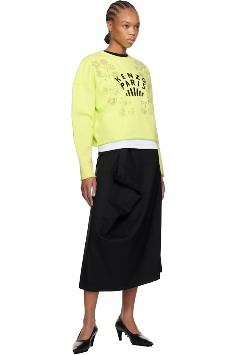 French terry sweatshirt. 

· Rib-knit crewneck
· Crystal-cut floral graphics and printed logo at front 
· Rolled raw edge at hem and cuffs
· Dropped shoulders

Supplier color: Lemon