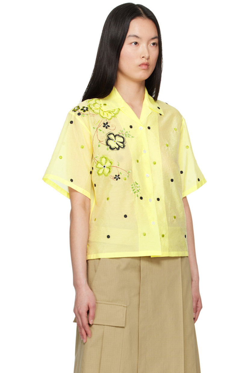 Semi-sheer viscose- and cotton-blend organza shirt. Polka-dot pattern embroidered throughout.

· Boxy-fit
· Open spread collar
· Button closure
· Embroidered and beaded floral graphic at front and back
· Logo-engraved hardware

Supplier color: Vanilla