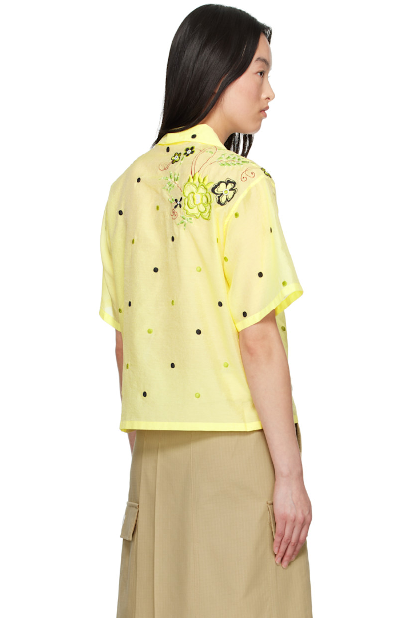 Semi-sheer viscose- and cotton-blend organza shirt. Polka-dot pattern embroidered throughout.

· Boxy-fit
· Open spread collar
· Button closure
· Embroidered and beaded floral graphic at front and back
· Logo-engraved hardware

Supplier color: Vanilla