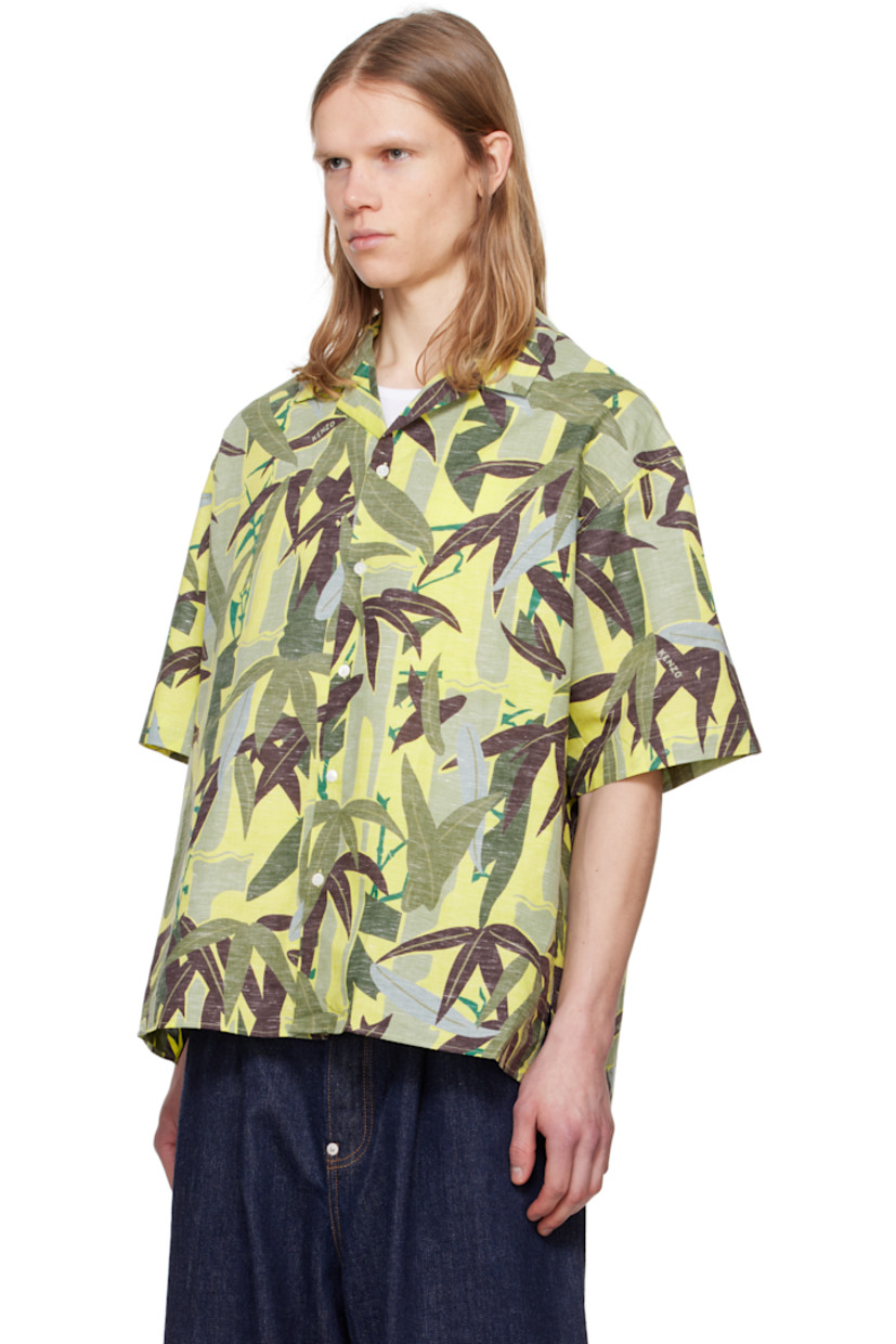 Plain-woven cotton- and linen-blend shirt. Graphic pattern printed throughout. 

· Spread collar
· Button closure 
· Vented side seams
· Dropped shoulders
· Inverted box pleat at back

Supplier color: Absinthe