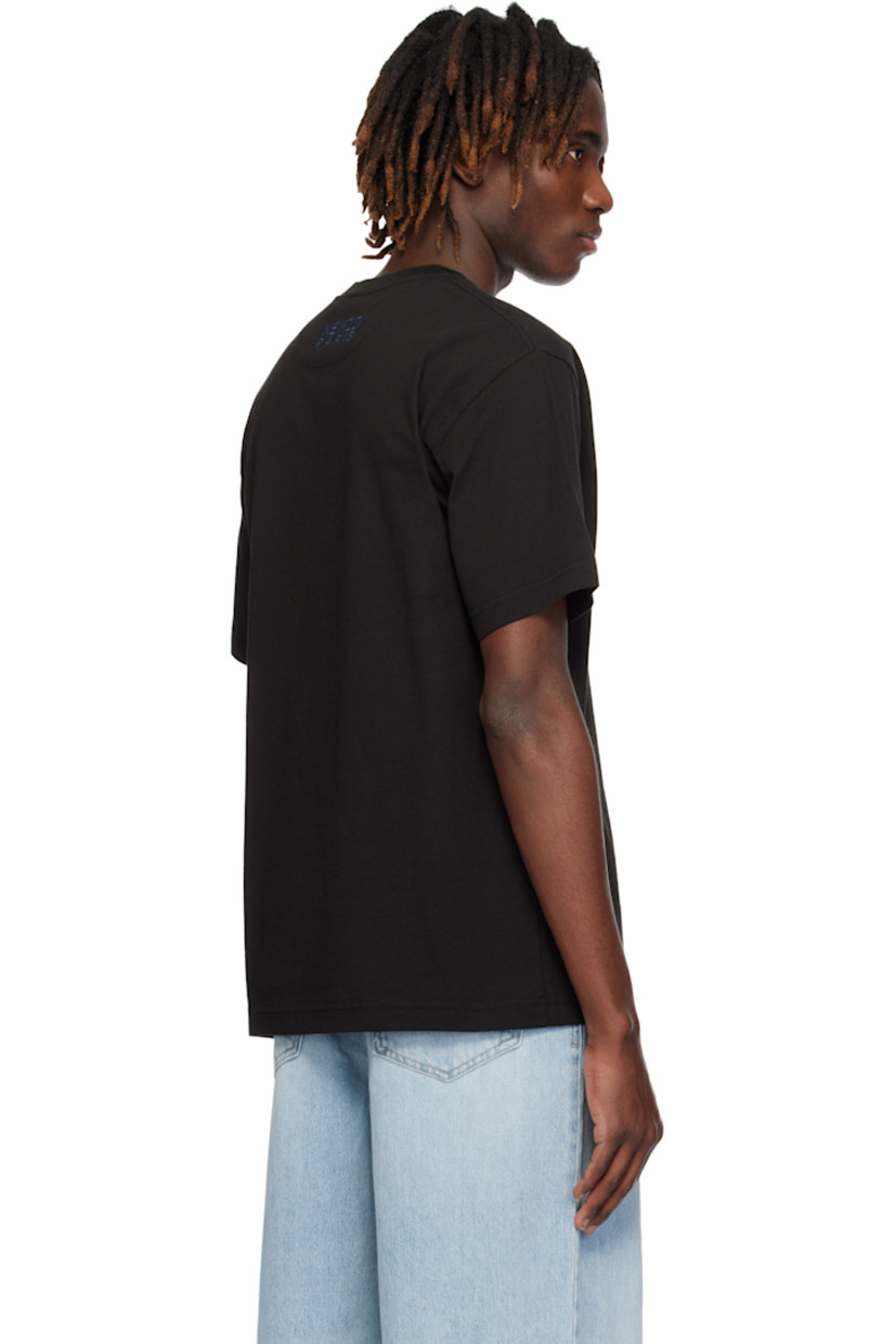GOTS-certified organic cotton jersey T-shirt. 

· Rib-knit crewneck
· Embroidered logo graphic patch at chest
· Logo embroidered at back collar

Supplier color: Black