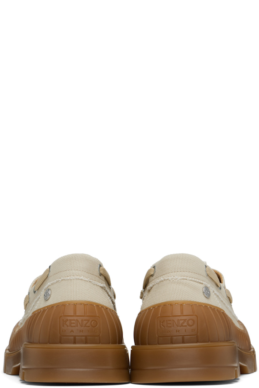 Cotton canvas boat shoes in beige.

· Rubber cap toe
· Lace-up closure
· Logo patch at tongue
· Logo hardware at outer side
· Logo embossed at heel counter
· Buffed leather and suede lining
· Textured rubber midsole
· Treaded rubber sole

Supplier color: Beige